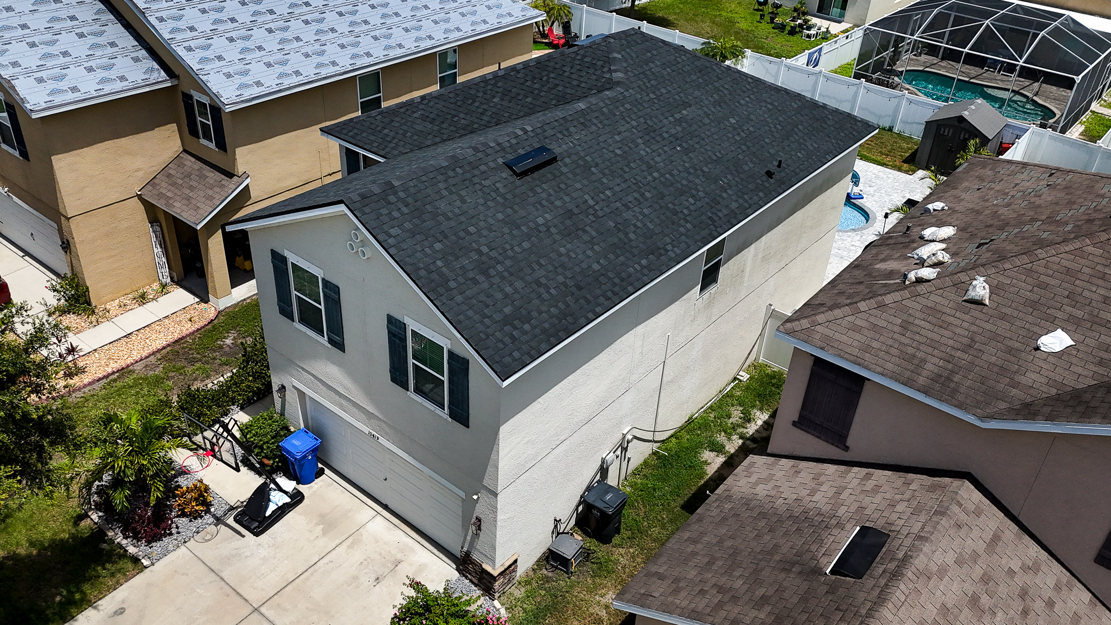 residential roofing services offered by everth roofing of america in greater tampa bay - riverview, florida using tamko titanxt premium architectural shingles in rustic black