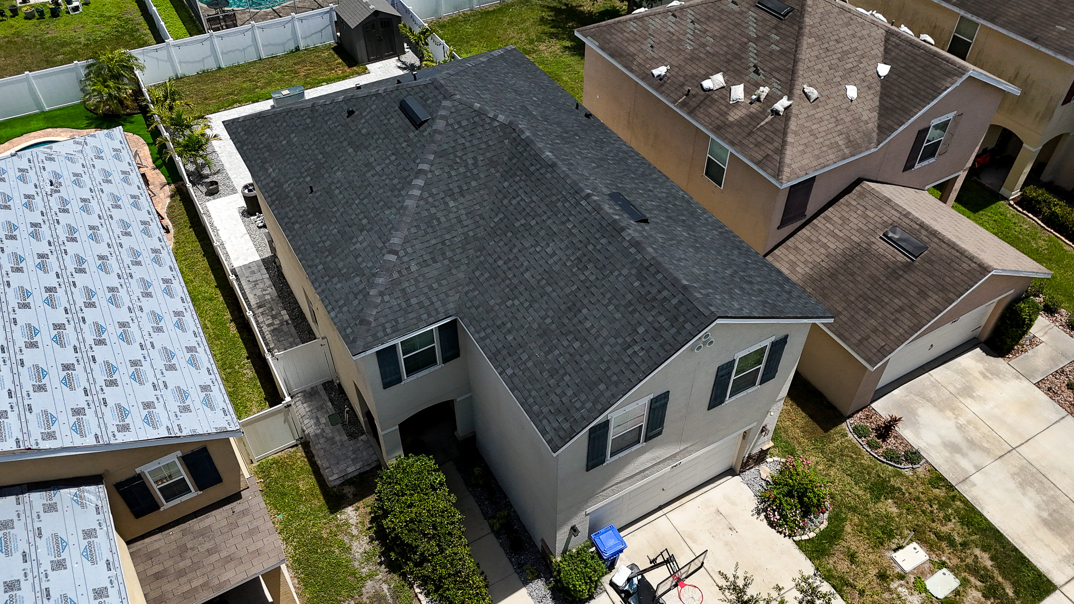 residential roofing services offered by everth roofing of america in greater tampa bay - riverview, florida using tamko titanxt premium architectural shingles in rustic black